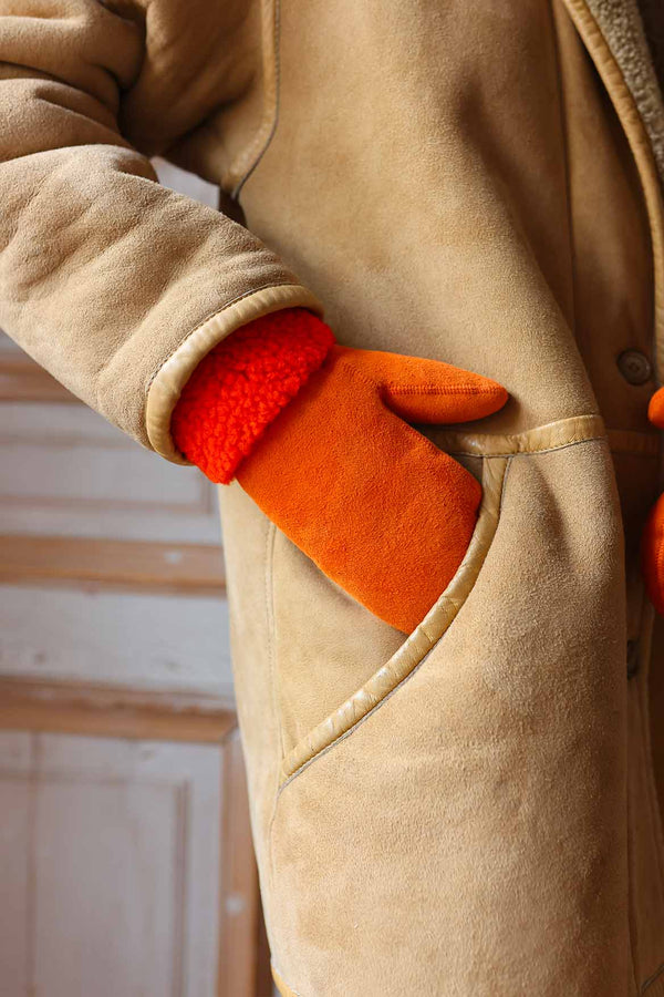 Orange sheepskin mittens